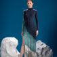 Tri Tone Polar Dress showing its sculpted neckline in a lifestyle view