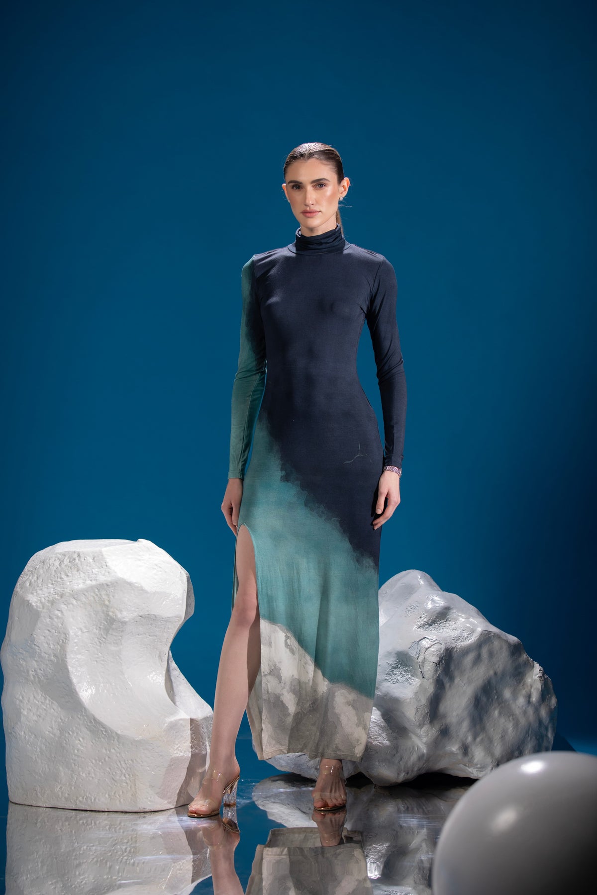 Tri Tone Polar Dress showing its sculpted neckline in a lifestyle view